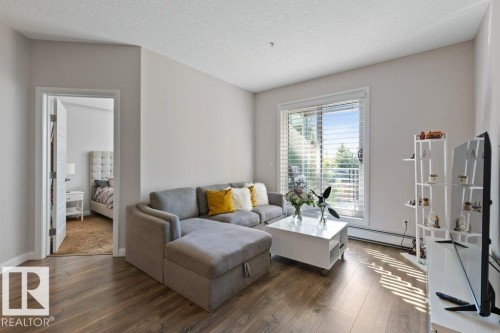 216 2588 Anderson Way, Edmonton, AB - Indoor Photo Showing Living Room