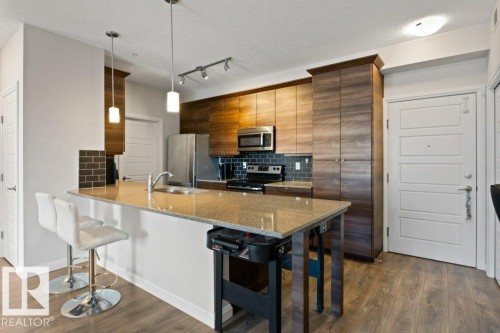 216 2588 Anderson Way, Edmonton, AB - Indoor Photo Showing Kitchen With Stainless Steel Kitchen With Upgraded Kitchen