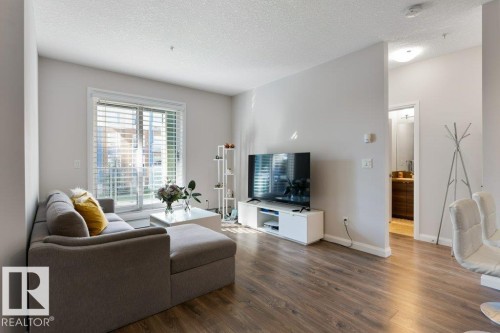 216 2588 Anderson Way, Edmonton, AB - Indoor Photo Showing Living Room