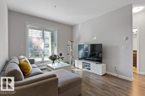 216 2588 Anderson Way, Edmonton, AB - Indoor Photo Showing Living Room