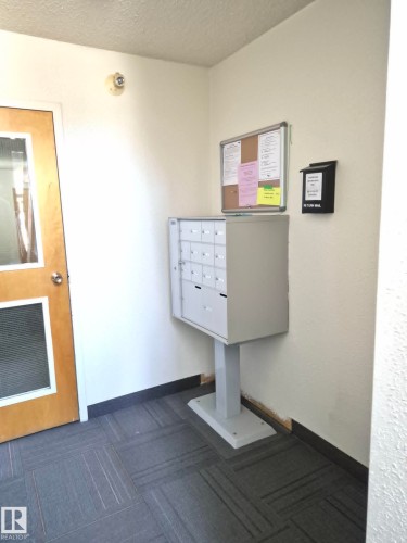 Mailbox station featuring multiple individual compartments - 304 34 Alpine Place, St. Albert, AB - Indoor Photo Showing Other Room