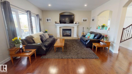 34 Vale Terrace, Fort Saskatchewan, AB - Indoor Photo Showing Living Room With Fireplace
