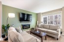 2819 Maple Way, Edmonton, AB  - Indoor Photo Showing Living Room With Fireplace 