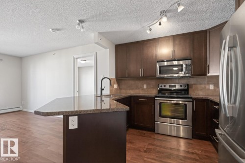 404 2204 44 Avenue, Edmonton, AB - Indoor Photo Showing Kitchen With Upgraded Kitchen