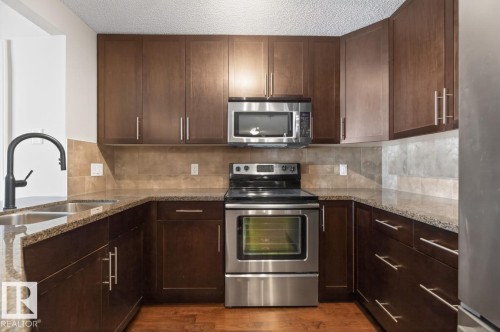 404 2204 44 Avenue, Edmonton, AB - Indoor Photo Showing Kitchen With Double Sink With Upgraded Kitchen