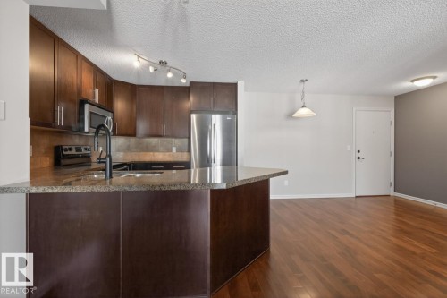 404 2204 44 Avenue, Edmonton, AB - Indoor Photo Showing Kitchen With Double Sink With Upgraded Kitchen