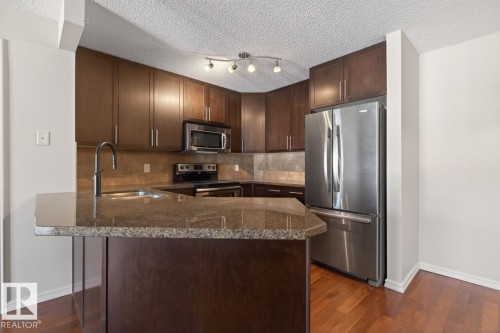 404 2204 44 Avenue, Edmonton, AB - Indoor Photo Showing Kitchen With Double Sink With Upgraded Kitchen