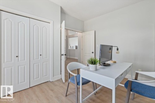 Room featuring light wood-finish flooring, light gray wall paint, and white trim - 7719 166 Avenue, Edmonton, AB - Indoor Photo Showing Dining Room