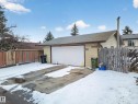 Attached single-car garage with a concrete driveway - 8312 29 Ave Nw, Edmonton, AB  - Outdoor With Exterior 