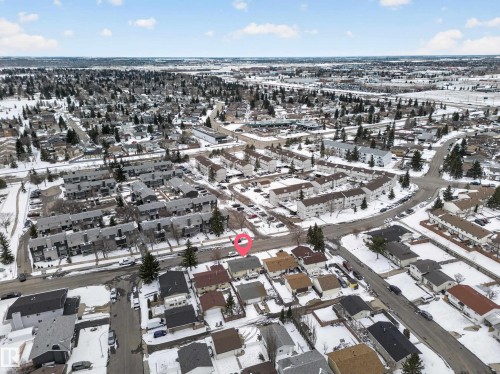 Residential neighborhood featuring detached homes and townhomes, established street grid, and mature trees - 8312 29 Ave Nw, Edmonton, AB - Outdoor With View