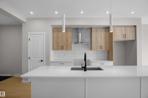 7113 51 Avenue, Beaumont, AB - Indoor Photo Showing Kitchen With Upgraded Kitchen