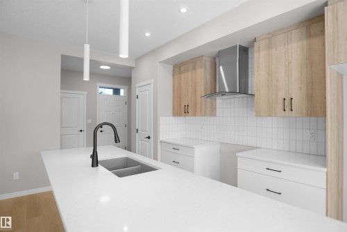 7113 51 Avenue, Beaumont, AB - Indoor Photo Showing Kitchen With Double Sink With Upgraded Kitchen