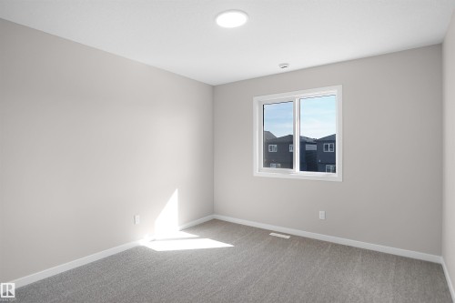 7113 51 Avenue, Beaumont, AB - Indoor Photo Showing Other Room