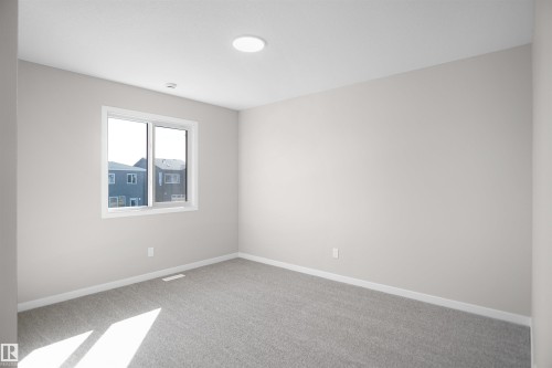 7113 51 Avenue, Beaumont, AB - Indoor Photo Showing Other Room