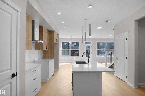 7113 51 Avenue, Beaumont, AB - Indoor Photo Showing Kitchen With Upgraded Kitchen