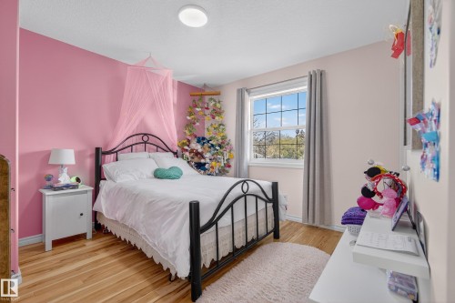 8705 92A Avenue, Edmonton, AB - Indoor Photo Showing Bedroom