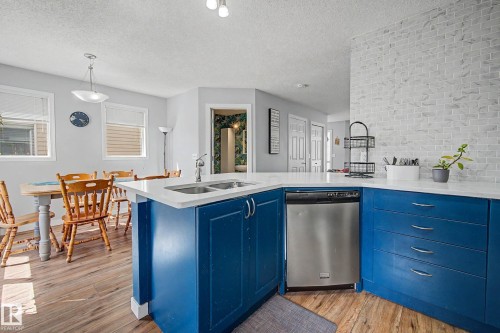 15 5281 Terwillegar Boulevard, Edmonton, AB - Indoor Photo Showing Kitchen With Double Sink