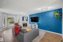 15 5281 Terwillegar Boulevard, Edmonton, AB  - Indoor Photo Showing Living Room With Fireplace 