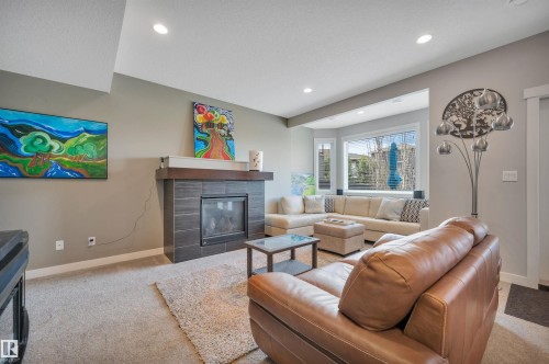437 Meadowview Drive, Fort Saskatchewan, AB - Indoor Photo Showing Living Room With Fireplace