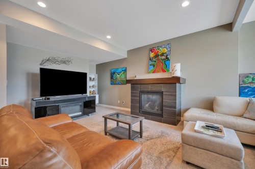 437 Meadowview Drive, Fort Saskatchewan, AB - Indoor Photo Showing Living Room With Fireplace
