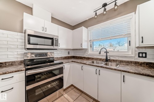 10226 152 Street, Edmonton, AB - Indoor Photo Showing Kitchen With Stainless Steel Kitchen With Double Sink