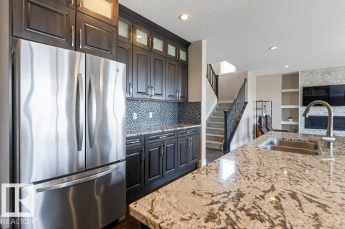 18 Executive Way, St. Albert, AB - Indoor Photo Showing Kitchen With Stainless Steel Kitchen With Double Sink With Upgraded Kitchen