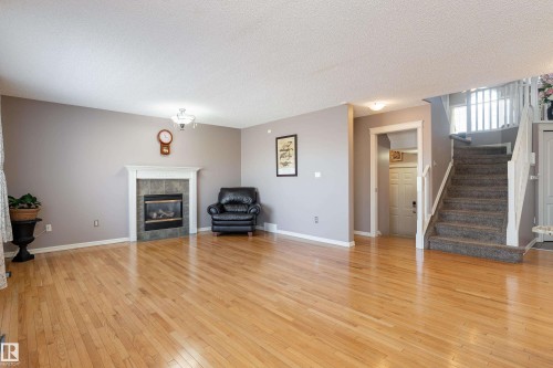 1044 Barnes Way, Edmonton, AB - Indoor Photo Showing Living Room With Fireplace