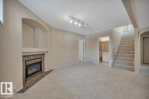 19 1203 Carter Crest Road, Edmonton, AB - Indoor With Fireplace