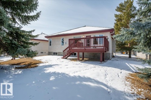 The property features a rear deck - 19 1203 Carter Crest Road, Edmonton, AB - Outdoor With Deck Patio Veranda