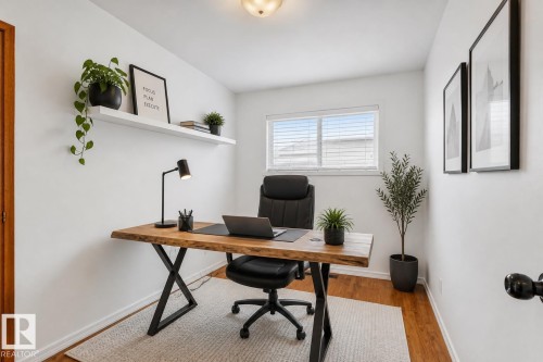 Dedicated room with wood-finish flooring and a window with blinds - 13516 104A Street, Edmonton, AB - Indoor Photo Showing Office
