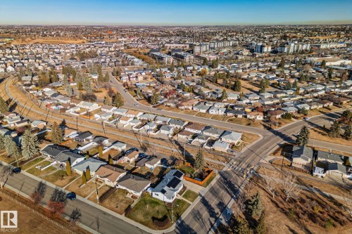 Expansive residential neighborhood with mature trees and varied housing styles - 13516 104A Street, Edmonton, AB - Outdoor With View