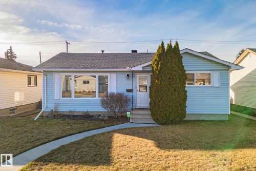 Light blue siding exterior with white trim - 13516 104A Street, Edmonton, AB - Outdoor