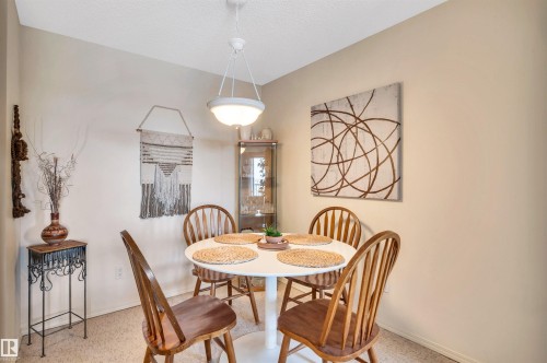409 2430 Guardian Road, Edmonton, AB - Indoor Photo Showing Dining Room