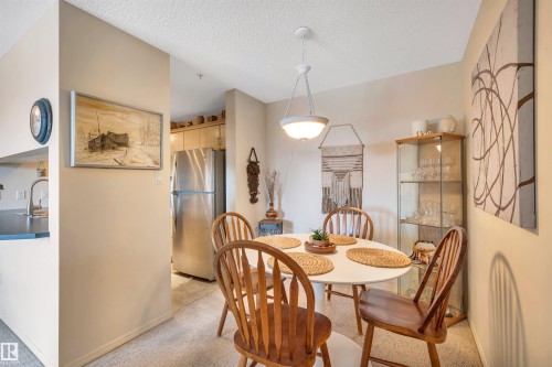 409 2430 Guardian Road, Edmonton, AB - Indoor Photo Showing Dining Room
