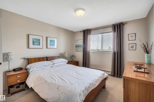 409 2430 Guardian Road, Edmonton, AB - Indoor Photo Showing Bedroom