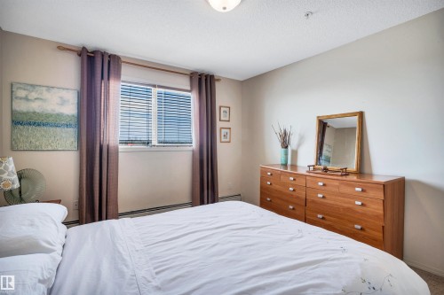 409 2430 Guardian Road, Edmonton, AB - Indoor Photo Showing Bedroom
