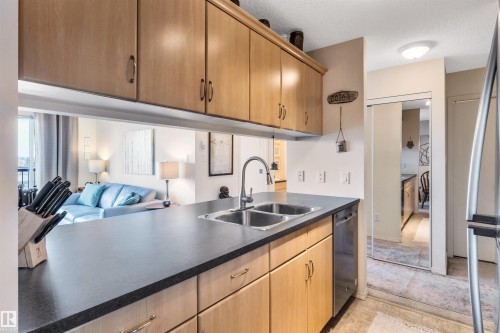409 2430 Guardian Road, Edmonton, AB - Indoor Photo Showing Kitchen With Double Sink