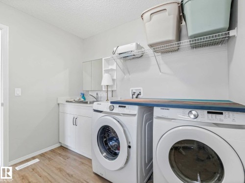 Image quality insufficient for description - 2435 12 Avenue, Edmonton, AB - Indoor Photo Showing Laundry Room