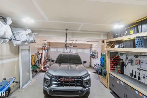 A Garage that a truck fits in! - 1825 Westerra Loop, Stony Plain, AB - Indoor Photo Showing Garage