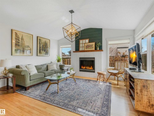 6129 Stinson Way, Edmonton, AB - Indoor Photo Showing Living Room With Fireplace