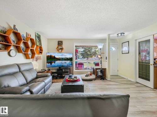 1102 Saddleback Road, Edmonton, AB - Indoor Photo Showing Living Room With Fireplace