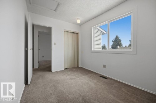 54 4403 Riverbend Road, Edmonton, AB - Indoor Photo Showing Other Room