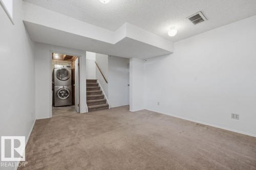 54 4403 Riverbend Road, Edmonton, AB - Indoor Photo Showing Other Room