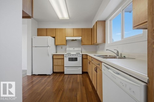 54 4403 Riverbend Road, Edmonton, AB - Indoor Photo Showing Kitchen With Double Sink