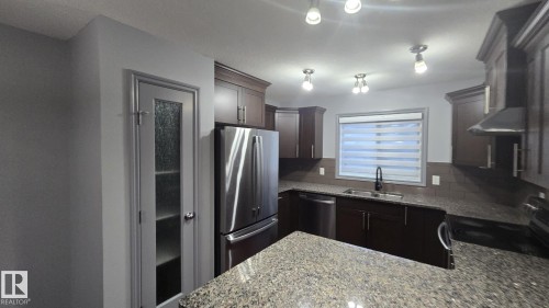3617 Weidle Bend Bend, Edmonton, AB - Indoor Photo Showing Kitchen With Double Sink
