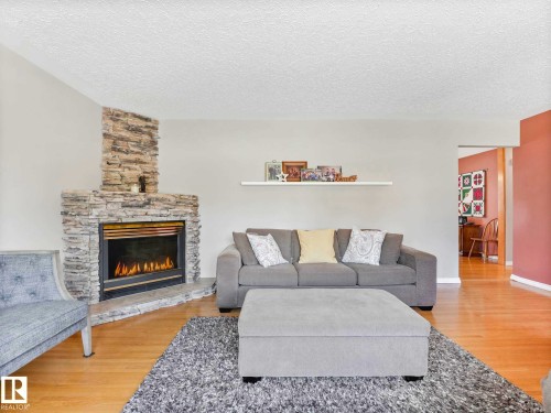 12303 131 Avenue, Edmonton, AB - Indoor Photo Showing Living Room With Fireplace