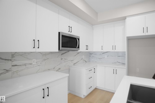 7002 50A Avenue, Beaumont, AB - Indoor Photo Showing Kitchen