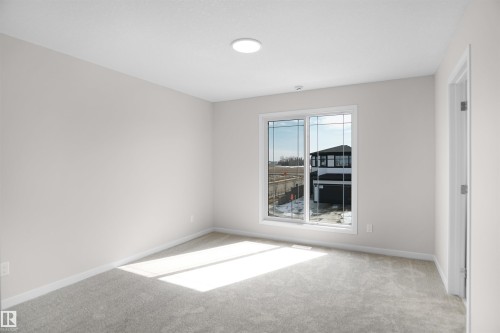 7002 50A Avenue, Beaumont, AB - Indoor Photo Showing Other Room