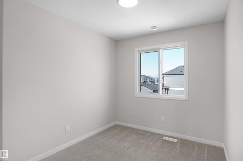 7002 50A Avenue, Beaumont, AB - Indoor Photo Showing Other Room