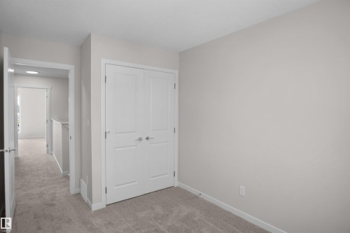 7002 50A Avenue, Beaumont, AB - Indoor Photo Showing Other Room
